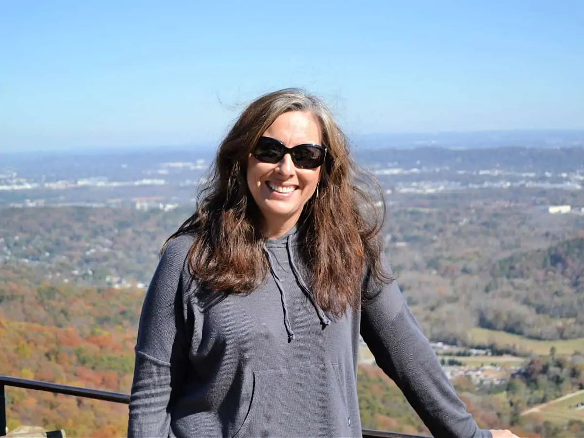Woman in front of Chattanooga overlook.
